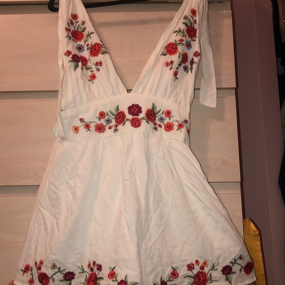 White Romper with flower embroidery